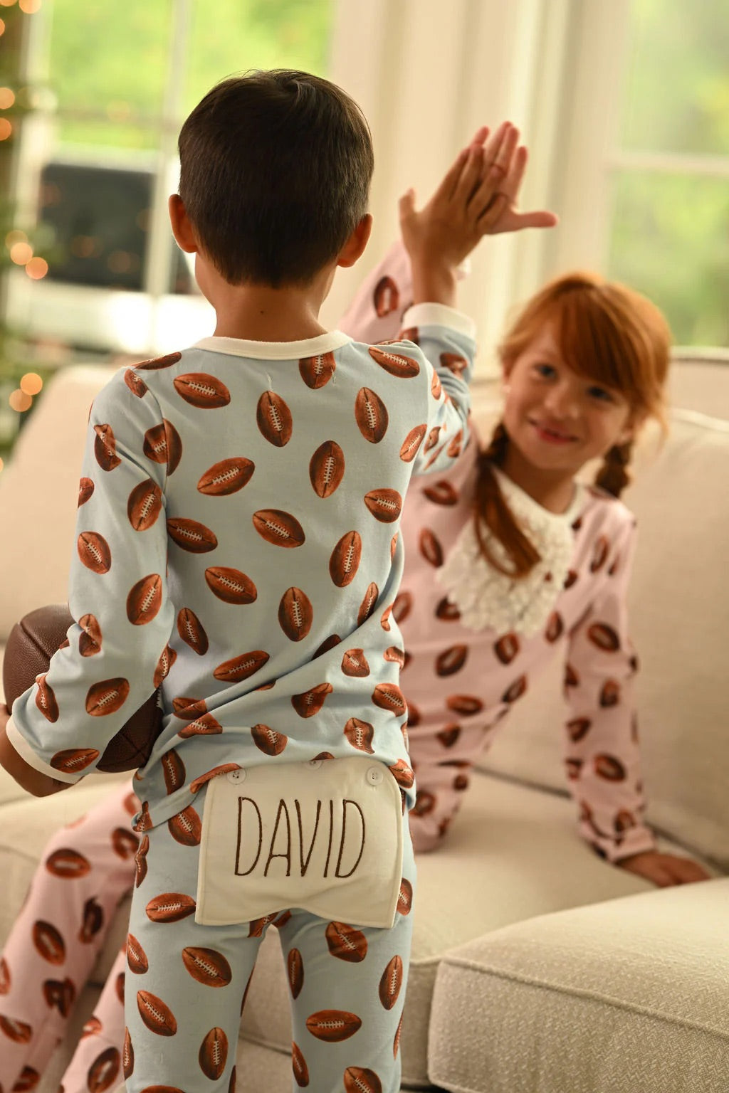 Sugar Bee Clothing One-Piece Buttflap Pajamas - Football